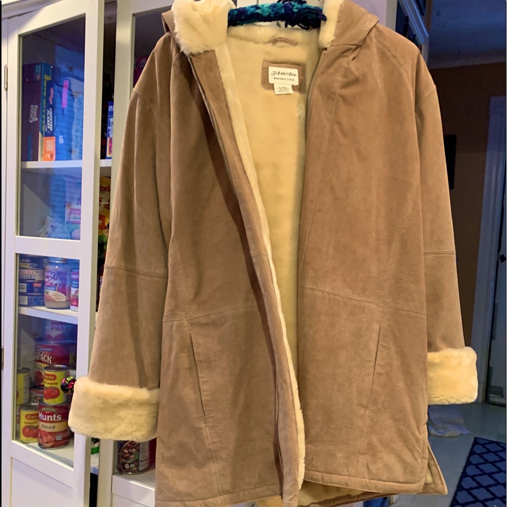 Woman’s camel suede coat